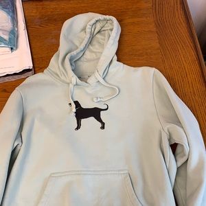 The Black Dog mint green hoodie.